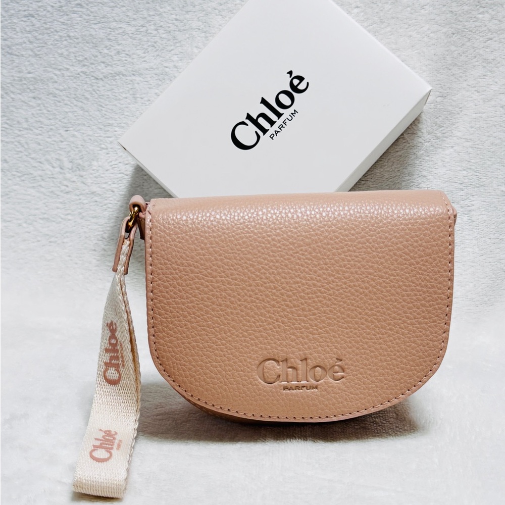 Chloe’ wristlet in blush pink leather.